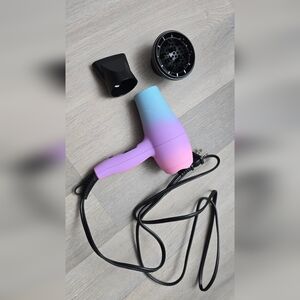 Relaxus Beauty Unicorn Mini Travel Blow Dryer in the ombré unicorn colorway.